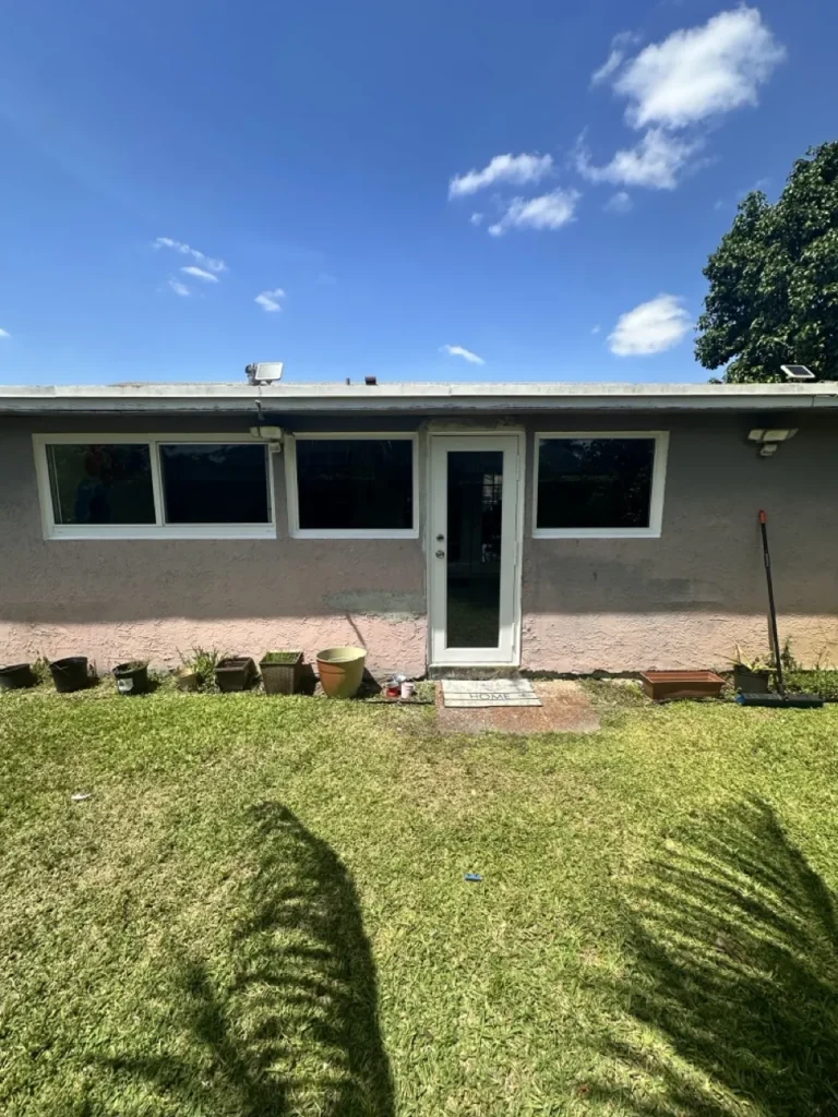 Single-story home in Boca Raton, FL with new impact windows across the back