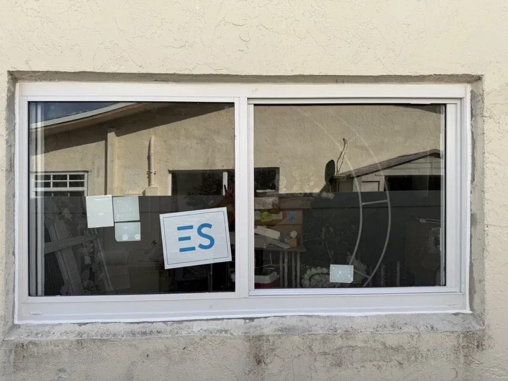 New impact sliding window installed in the same opening in Broward County